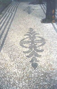 Decorative rock design in street.